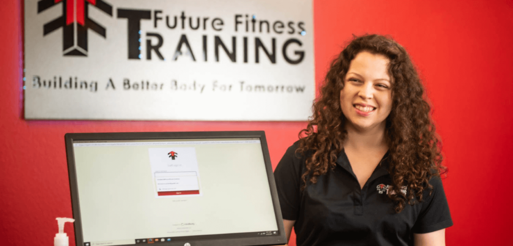 team member smiling at Future Fitness Training